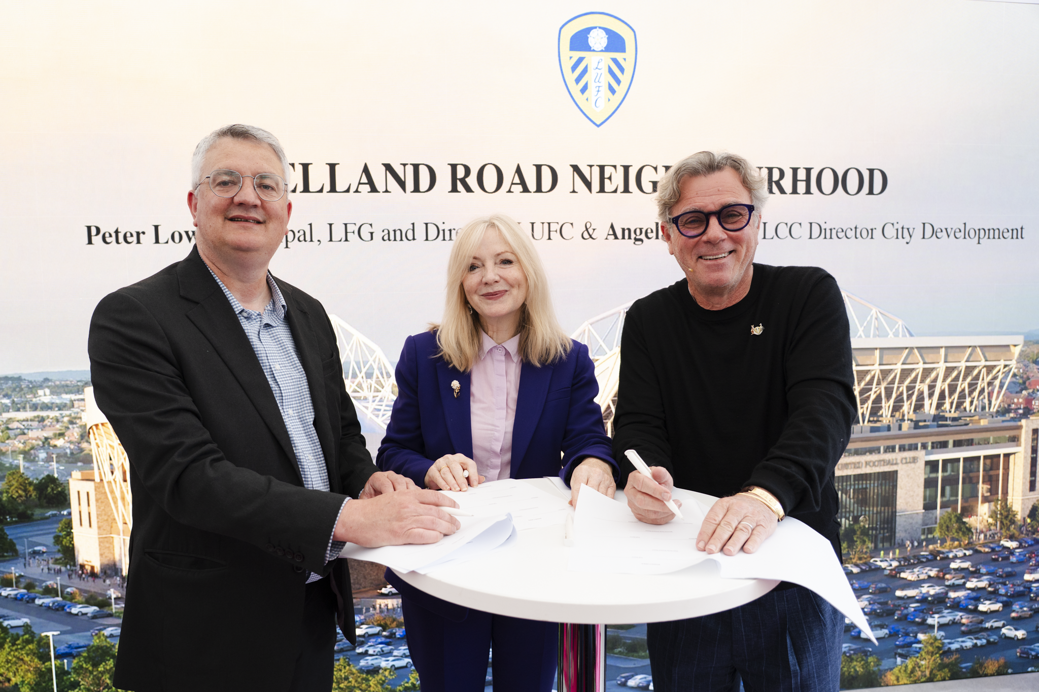 West Yorkshire and Leeds leaders signing an agreement at UKREiiF